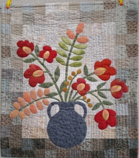 Appliqueren op een patchwork ondergrond